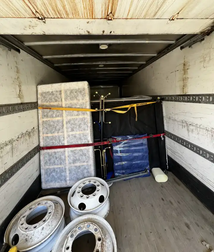 What's Included in Ottawa Next Movers Commercial Moving Service Ottawa Next Movers team moving commercial furniture and business equipment