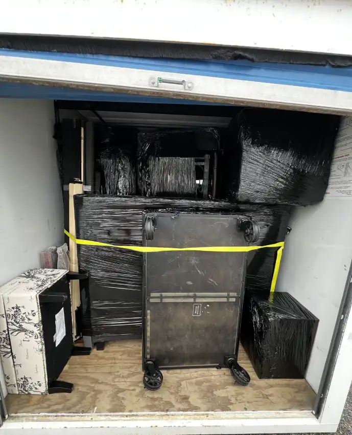 What's Included in Ottawa Next Movers Office Moving Service Ottawa Next Movers team packing office furniture and equipment for relocation