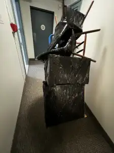 Furniture protected with moving blankets before transport