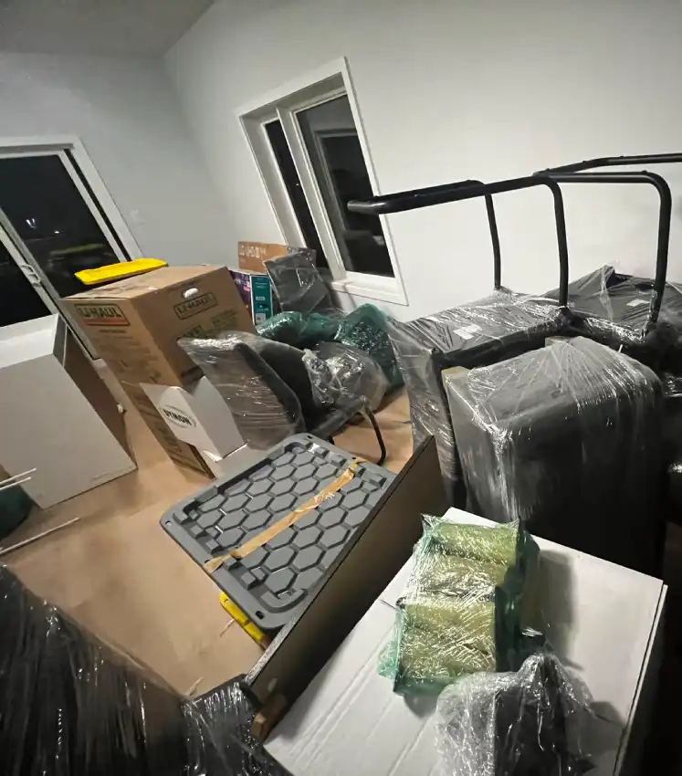 Ottawa Next Movers long distance moving team loading furniture into a moving truck
