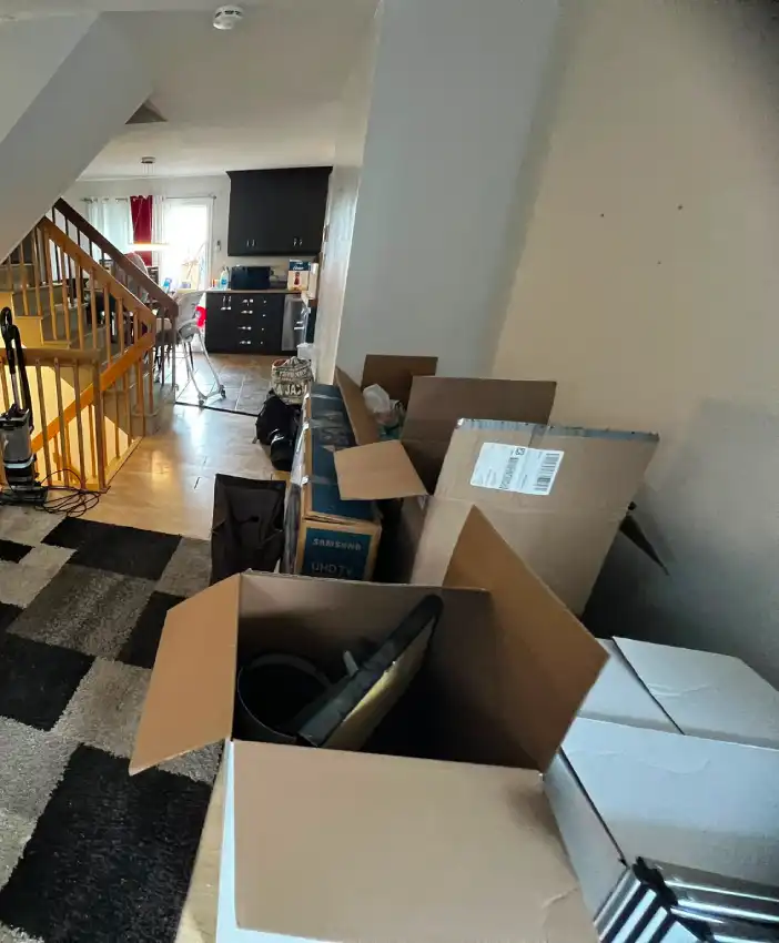 What's Included in Ottawa Next Movers Senior Moving Service Ottawa Next Movers movers carefully packing and moving belongings for a senior relocation